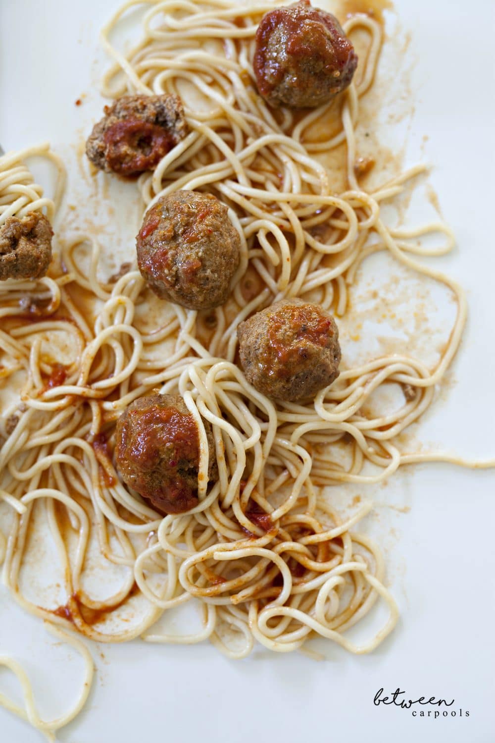 The Iconic Meatball Dinner You’ll Make Again and Again These meatballs and spaghetti get them full and keep them happy. Between Carpools - A Lifestyle Blog for the busy Jewish Woman.